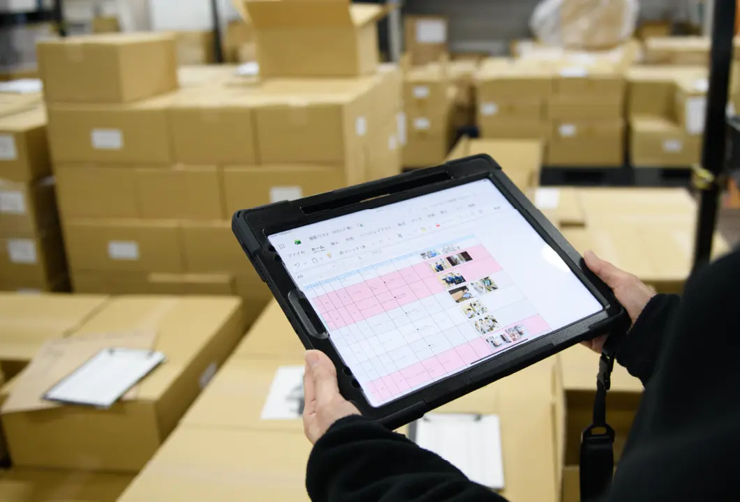 [写真]自社システムの開発